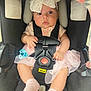 baby, baby_girl, bow, car_seat, child, child_safety, closeup, clothing, cute, holding, indoors, infant, looking, person, pink_outfit, portrait, safety_harness, seat, socks, young_child