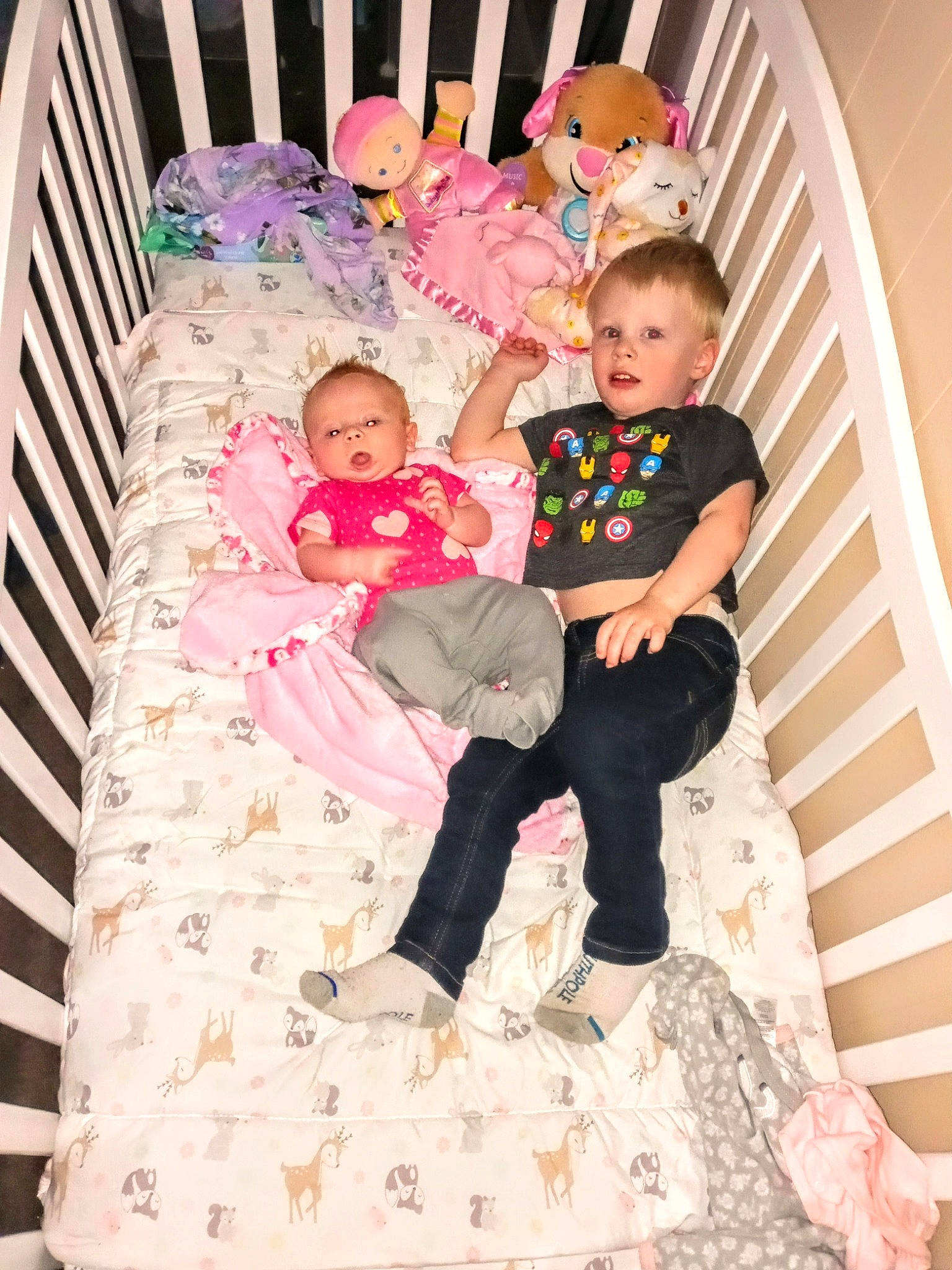 Liam joined the competition — help win amazing prizes! baby, baby_toddler_clothing, child, comfort, cradle, fun, happy, head, lap, leg, linens, magenta, pattern, person, pink, product, room, sitting, sock, textile