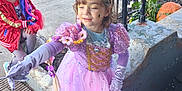 Rosa joined the competition — help win amazing prizes! child, costume, princess, pink_dress, tiara, magic_wand, outdoor, sidewalk, pumpkin, porch, car, tree, play, fun, face_paint, gloves, jacket, fishnet_tights, footwear, happy