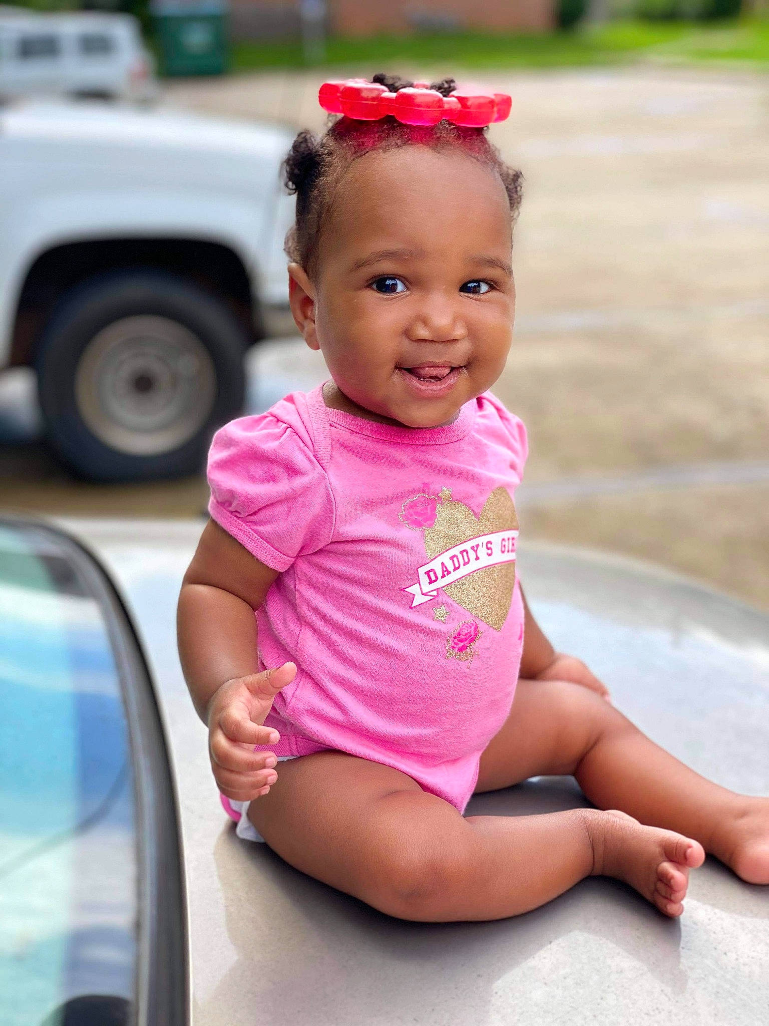Kaitlyn is registered to the contest to win money with this photo: baby, baby_products, baby_toddler_clothing, car, child, child_model, fun, leisure, lip, person, photography, pink, play, product, sitting, skin, smile, summer, toddler, vacation