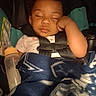 Amri joined the competition — help win amazing prizes! baby, sleeping, child, car_seat, seatbelt, passenger, portrait, face, hand, blanket, bottle, infant, travel, vehicle, indoors, cozy, resting, closed_eyes, clothing, photography
