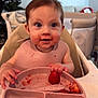 baby, infant, child, highchair, bib, strawberry, fruit, messy_face, meal_time, plate, feeding, hands, smile, big_eyes, kitchen, playpen, sofa, christmas_tree, pink, teether