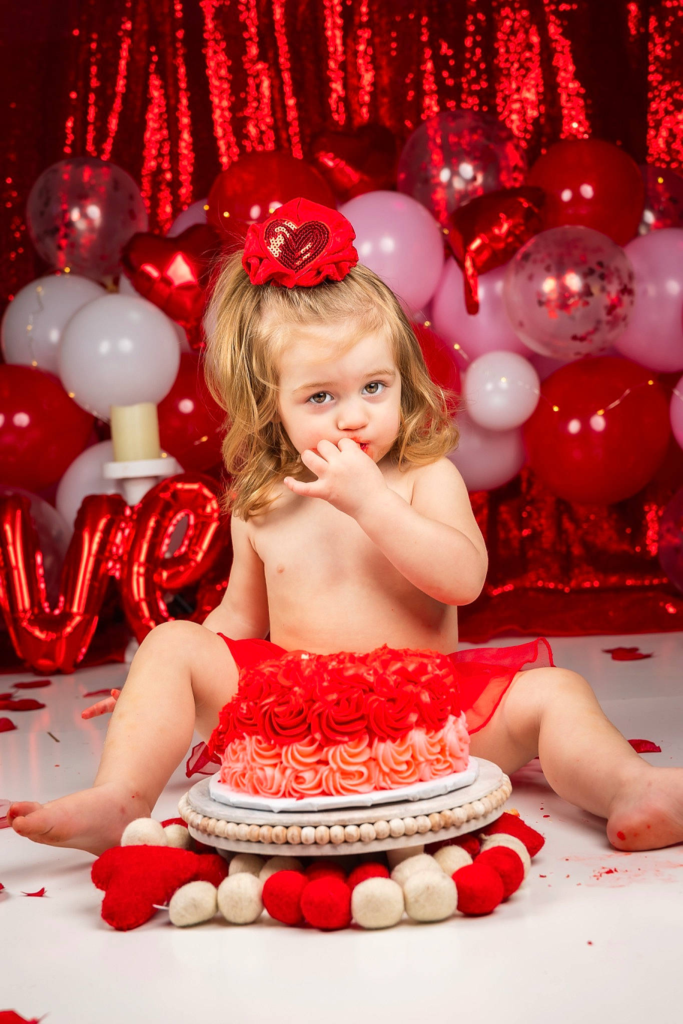 Jonessa joined the competition — help win amazing prizes! beauty, child, christmas, christmas_decoration, christmas_ornament, decoration, event, facial_expression, fun, happy, holiday, human, lighting, mammal, ornament, party_supply, person, pink, red, sweetness