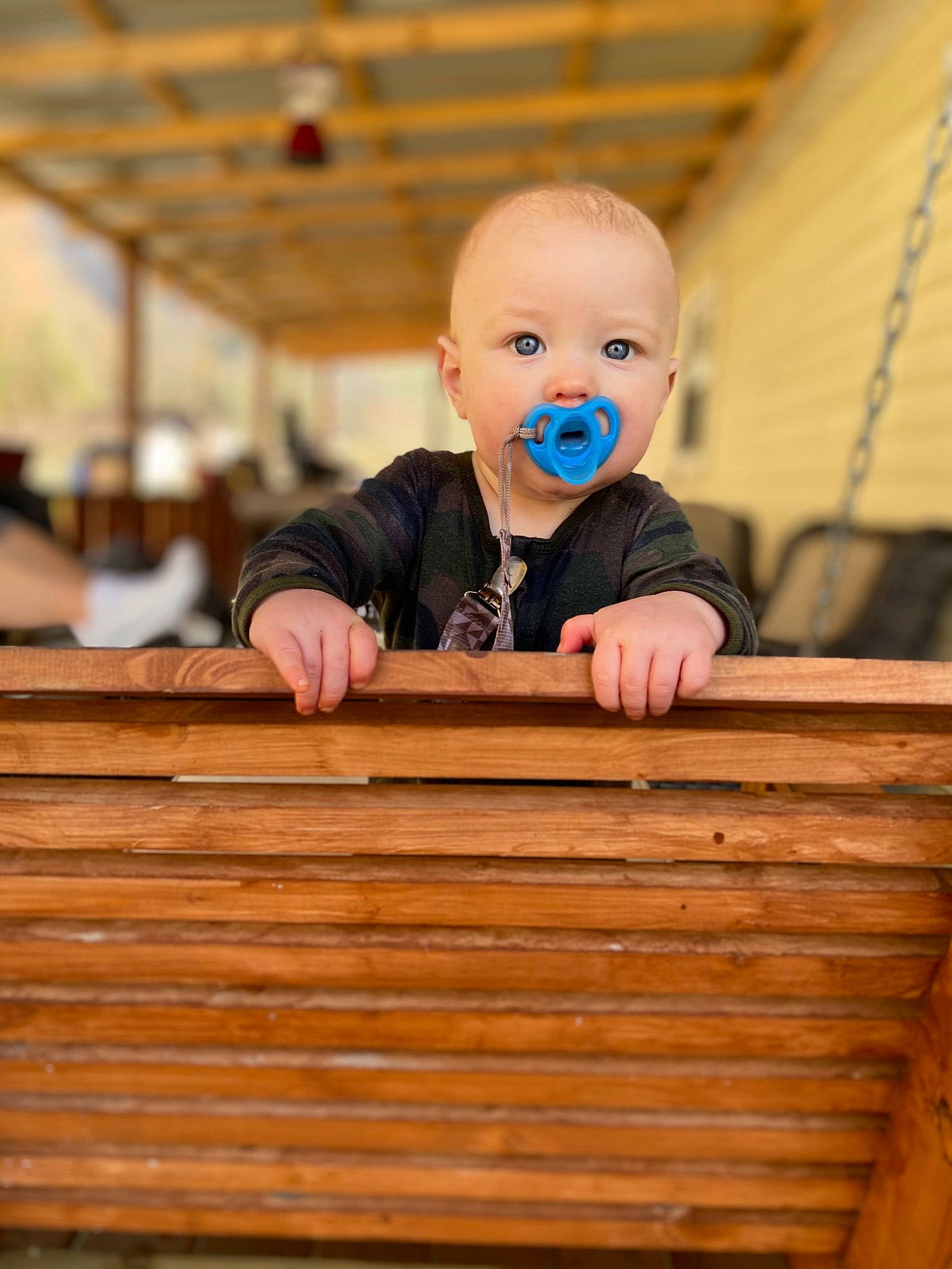 William is registered to the contest to win money with this photo: baby, baby_toddler_clothing, cheek, child, facial_expression, floor, flooring, fun, happy, hardwood, person, plank, room, sitting, sleeve, t_shirt, toddler, varnish, wood, wood_flooring