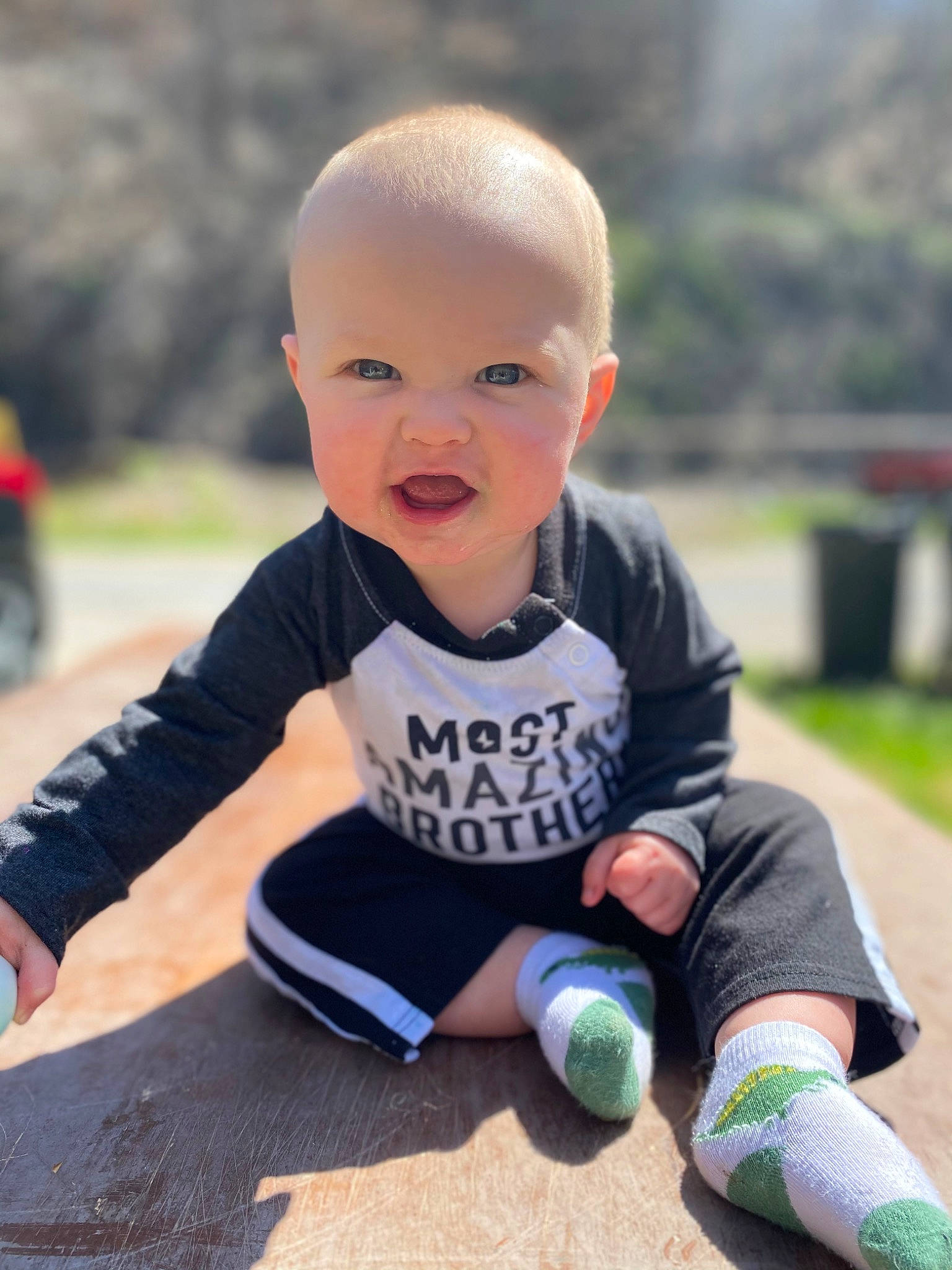 William is registered to the contest to win money with this photo: baby, baby_playing_with_toys, baby_toddler_clothing, child, finger, flooring, fun, grass, happy, knee, leisure, person, play, recreation, sitting, skin, sleeve, smile, sock, t_shirt