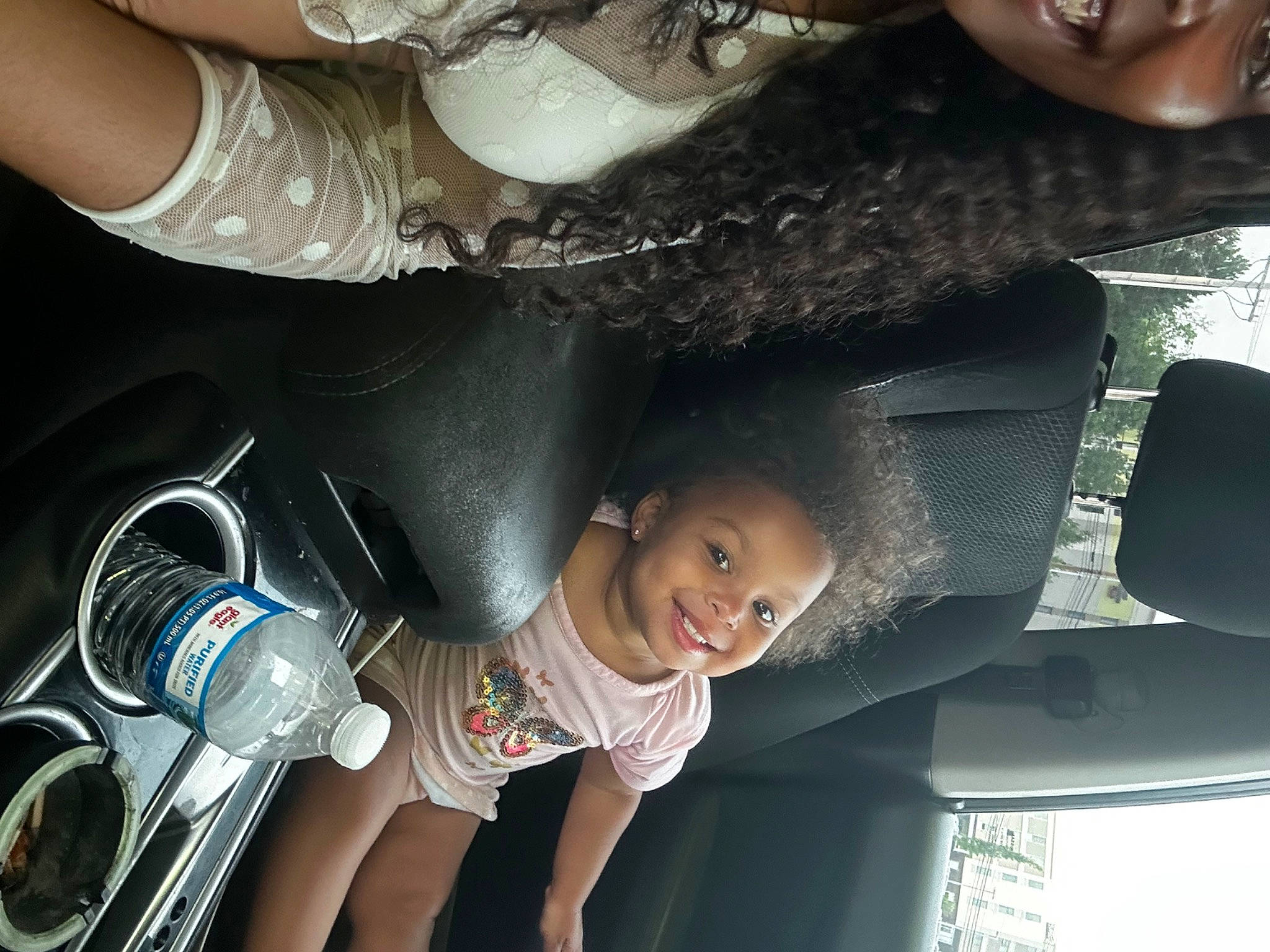 Nora is registered to the contest to win money with this photo: auto_part, automotive_design, automotive_exterior, automotive_lighting, bumper, child, eyewear, finger, flash_photography, fun, gesture, hand, happy, joy, light, luxury_vehicle, person, smile, snapshot, toddler