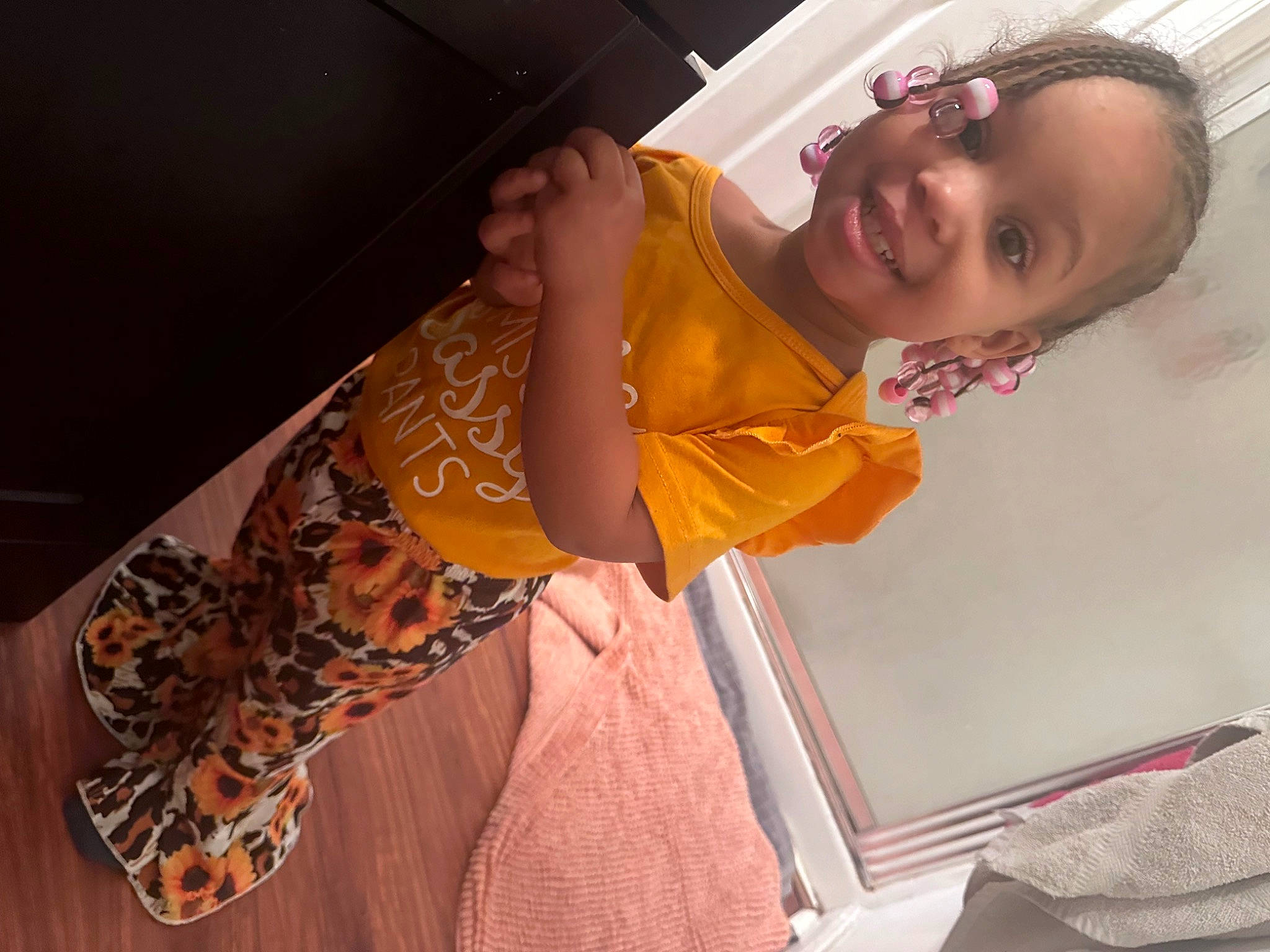 Nora is registered to the contest to win money with this photo: abdomen, arm, comfort, event, fashion_design, finger, fun, happy, human_leg, jewellery, joy, pattern, peach, person, room, sari, shoulder, skin, smile, thigh