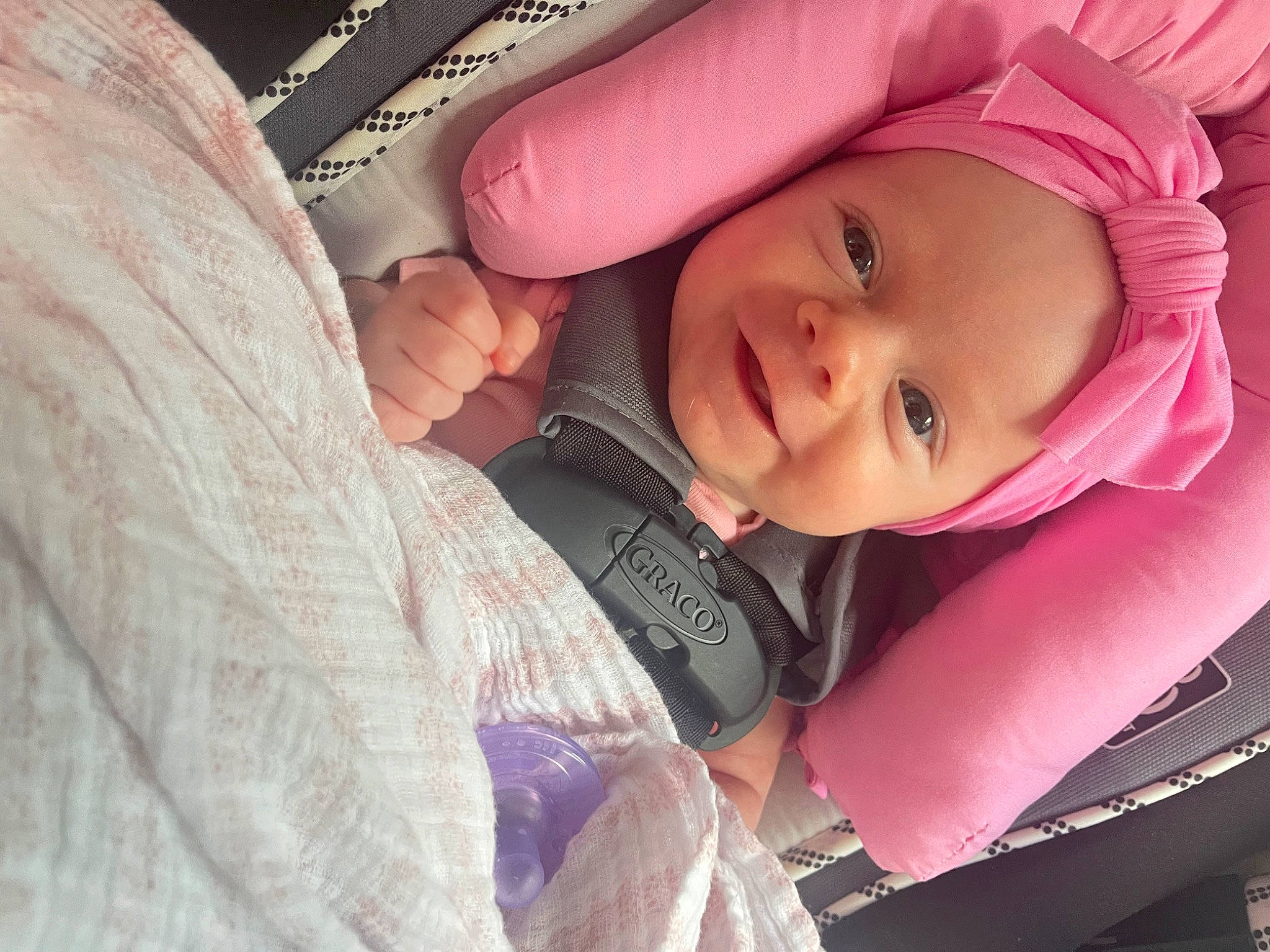 Mila joined the competition — help win amazing prizes! baby, baby_carriage, baby_products, baby_toddler_clothing, cheek, child, comfort, eyelash, fashion_accessory, gesture, happy, headwear, iris, lip, magenta, mouth, nail, person, pink, skin