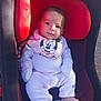 attention, baby, baby_accessory, bib, black, car_seat, child, comfort, cute, face, footwear_free, infant, minnie_mouse, outdoor, person, portrait, red, seat, sunlight, white_clothing