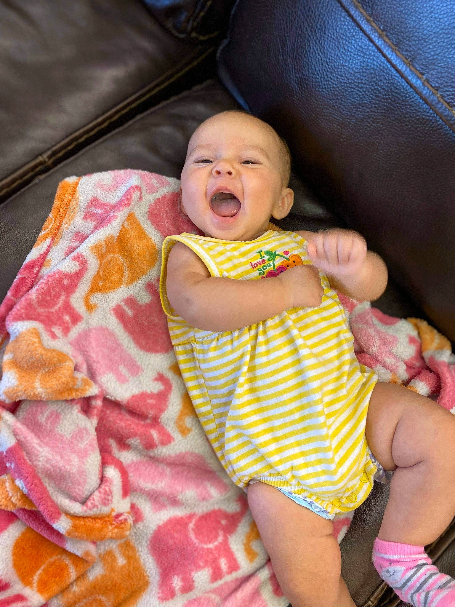 Jazmyn joined the competition — help win amazing prizes! baby, cheek, child, fun, person, pink, sitting, skin, smile, toddler, vacation, yellow
