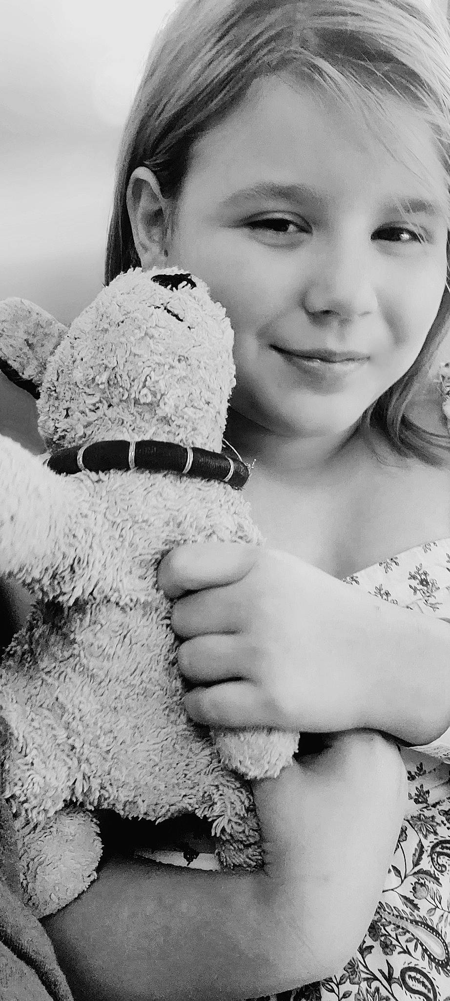 Sophia joined the competition — help win amazing prizes! black, black_and_white, eye, eyelash, face, flash_photography, gesture, hair, hand, happy, head, lip, nose, organ, person, photograph, skin, smile, style, toy