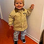 Roméo a rejoint le concours — aidez-le/la à gagner de superbes lots ! toddler, child, smiling, jacket, beige_jacket, jeans, rolled_jeans, black_shoes, indoor, wall, floor, happy, standing, person, cute, young_child, casual_clothing, portrait, head, face