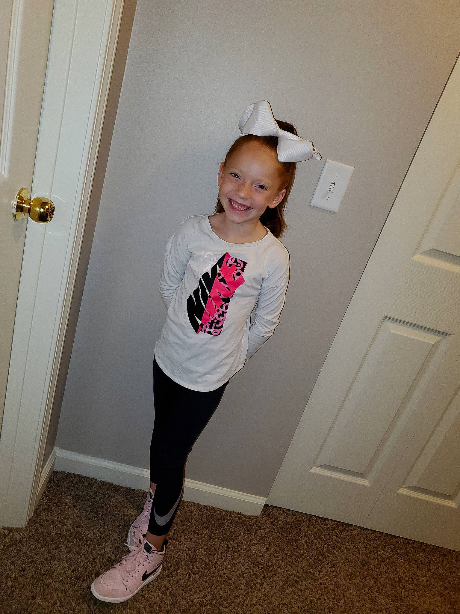 Alizé is registered to the contest to win money with this photo: child, clothing, costume, fashion_accessory, footwear, joy, knee, leg, leggings, person, pink, shoe, shoulder, sleeve, sportswear, standing, t_shirt, tights, toddler, trousers