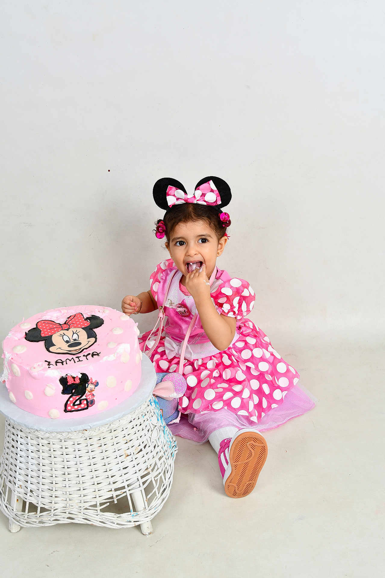 Lamita joined the competition — help win amazing prizes! child, toddler, birthday_cake, pink_dress, minnie_mouse, polka_dots, headband, cake, white_background, wicker_stool, celebration, happy, smiling, sitting, party, shoes, cute, indoor, young_child, food
