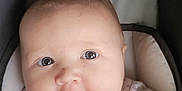 Phenoix joined the competition — help win amazing prizes! baby, infant, face, cushion, clothing, pink, seat, child, portrait, cute, soft, indoor, person, looking, head, skin, eyes, expression, newborn, blanket