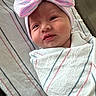 Dafne is registered to the contest to win money with this photo: architecture, baby, bed, blanket, building, clothing, face, furniture, glove, happy, hat, head, hospital, newborn, person, photography, portrait, quilt, smile, towel