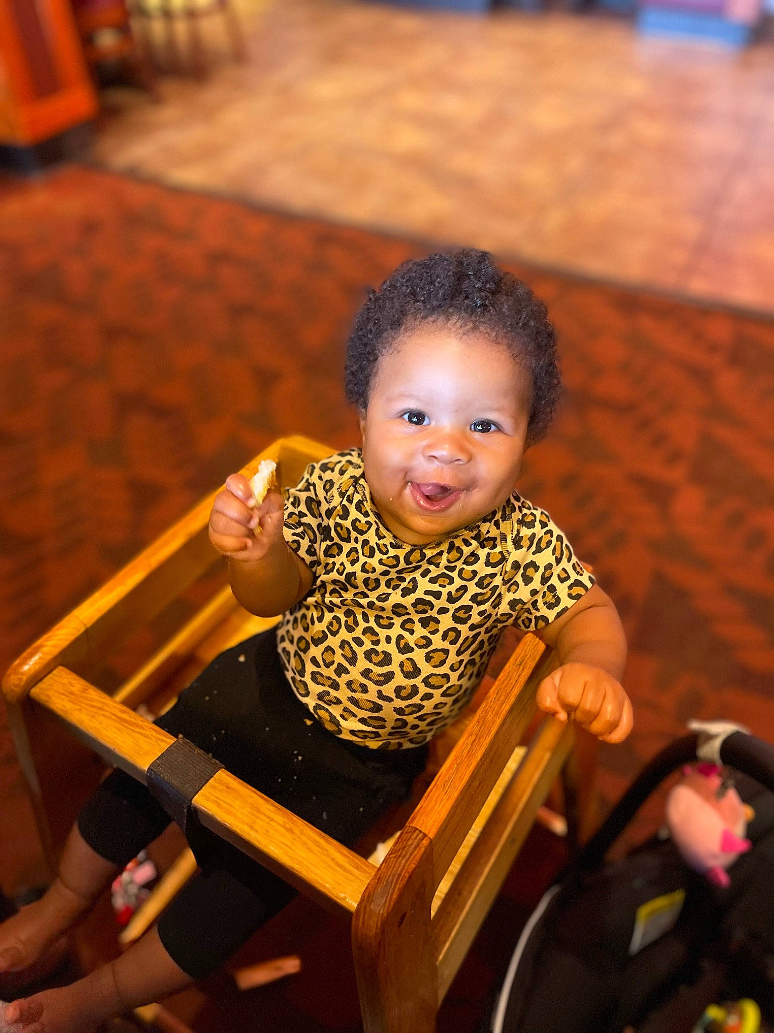 Skylar is registered to the contest to win money with this photo: baby, baby_toddler_clothing, chair, cheek, child, comfort, finger, flash_photography, flooring, fun, happy, hardwood, leisure, person, portrait_photography, room, sitting, smile, toddler, vacation