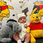 Aj is registered to the contest to win money with this photo: animal, baby, bear, blanket, clothing, couch, cushion, face, furniture, hat, head, homedecor, hosiery, newborn, person, photography, plush, portrait, sock, toy