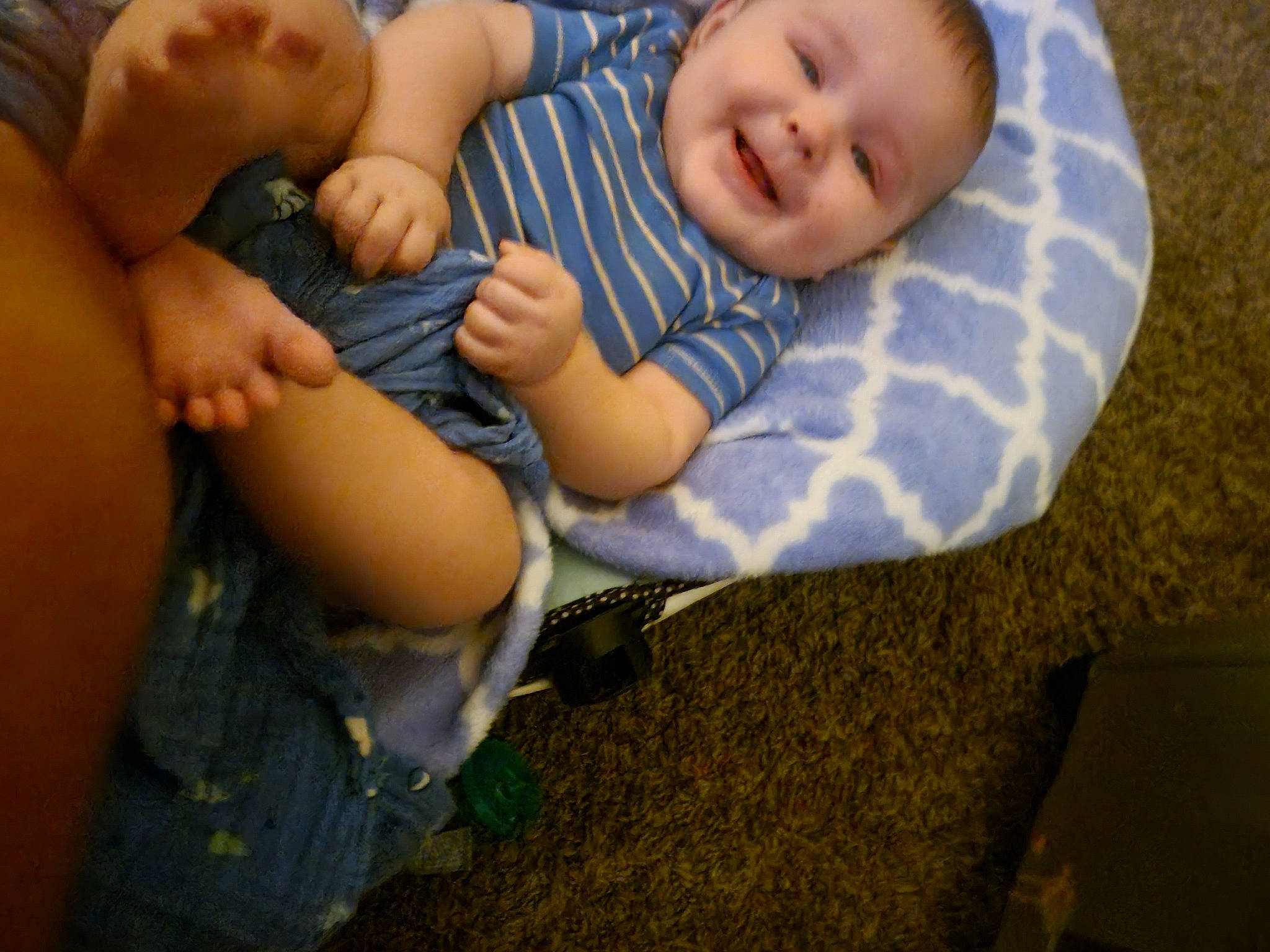 Abel is registered to the contest to win money with this photo: baby, baby_toddler_clothing, child, comfort, elbow, finger, fun, gesture, grass, hand, happy, human_body, human_leg, joy, people_in_nature, person, sitting, skin, smile, thumb