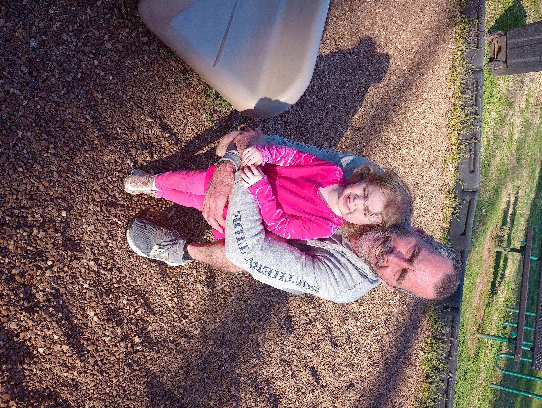 Kaya is registered to the contest to win money with this photo: foot, fun, grass, happy, human_leg, leaf, leisure, magenta, people_in_nature, person, pink, plant, recreation, shadow, sitting, sneakers, soil, tints_and_shades, toddler, tree