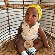 Noah joined the competition — help win amazing prizes! baby, infant, eight_months_sign, rattan_chair, wicker, yellow_hat, onesie, sneakers, portrait, cute, big_eyes, sitting, home_interior, wooden_milestone, soft_lighting, cute_expression, closeup, natural_light, basket_chair, chubby_legs