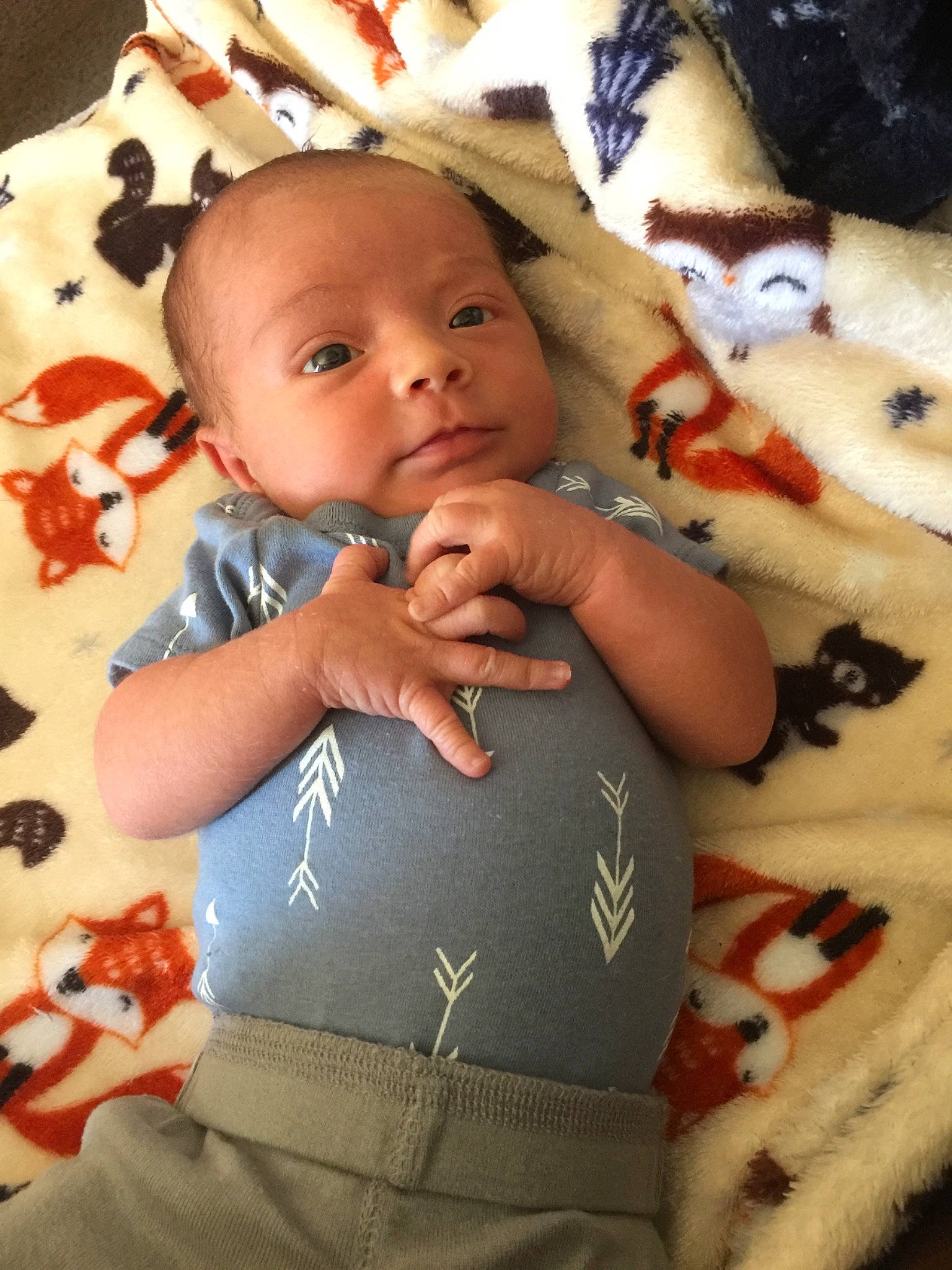 Julius is registered to the contest to win money with this photo: arm, baby, baby_toddler_clothing, cheek, comfort, eye, face, facial_expression, finger, hand, happy, head, human, lip, nose, person, pink, product, red, skin