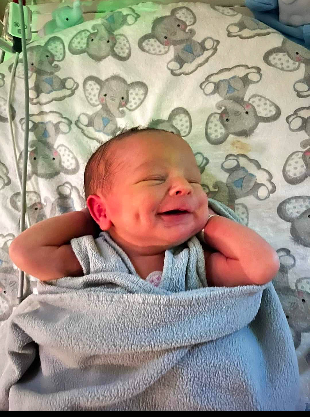 Lyric joined the competition — help win amazing prizes! baby, baby_toddler_clothing, cheek, child, comfort, fun, grass, happy, linens, mouth, pattern, person, portrait_photography, room, sitting, skin, sleeve, smile, textile, toddler