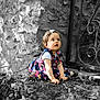 Ambre participe au concours pour gagner de l'argent avec cette photo : toddler, child, girl, color_pop, floral_dress, curly_hair, outdoor, stone_wall, gate, nature, plants, soil, sitting, portrait, cute, curious, baby_hairclip, daylight, shadows, playful
