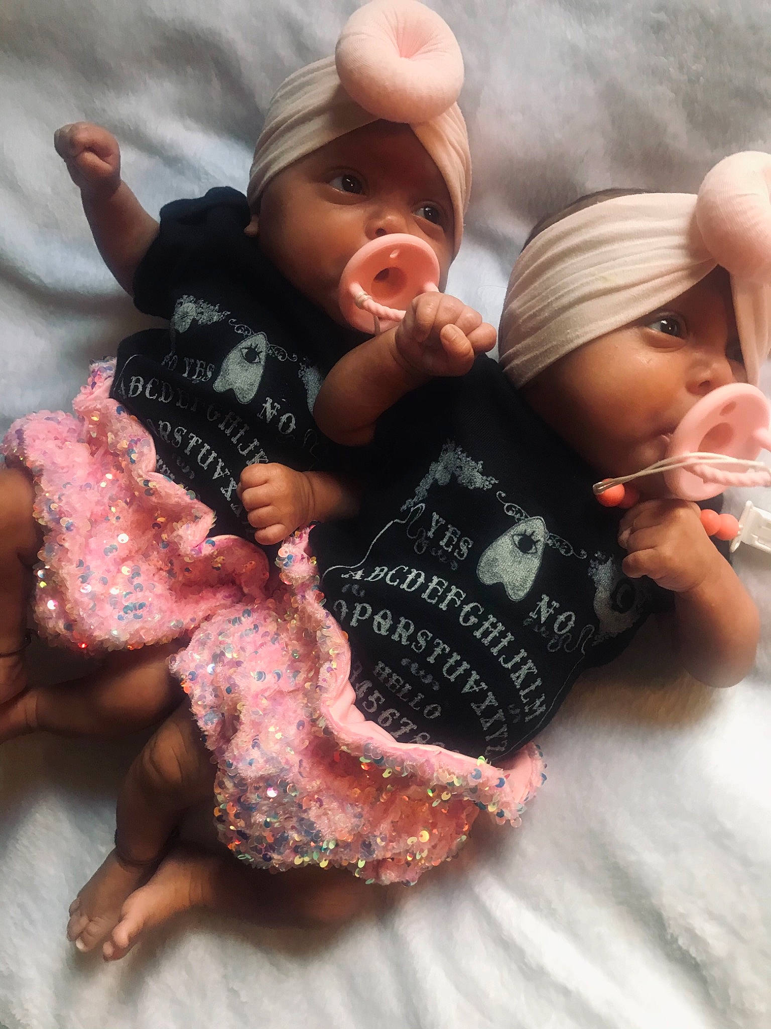 Willow And Winona joined the competition — help win amazing prizes! baby, baby_toddler_clothing, cap, comfort, finger, gesture, hand, happy, headgear, human_body, interaction, joint, nail, person, pink, skin, sleeve, textile, thumb, toddler