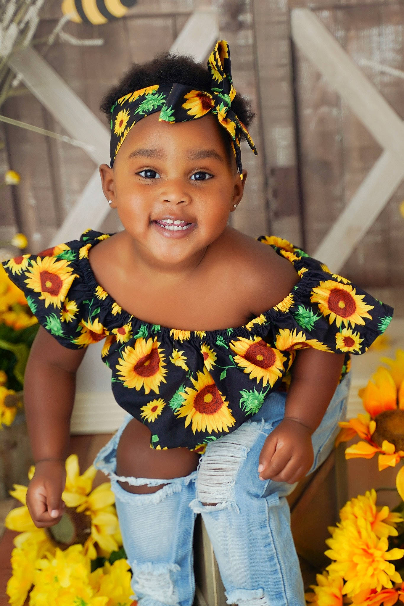 Makaylah joined the competition — help win amazing prizes! abdomen, child, event, facial_expression, fashion_accessory, flower, flower_arranging, fun, happy, headpiece, jewellery, joy, lei, orange, person, photograph, plant, smile, temple, toddler