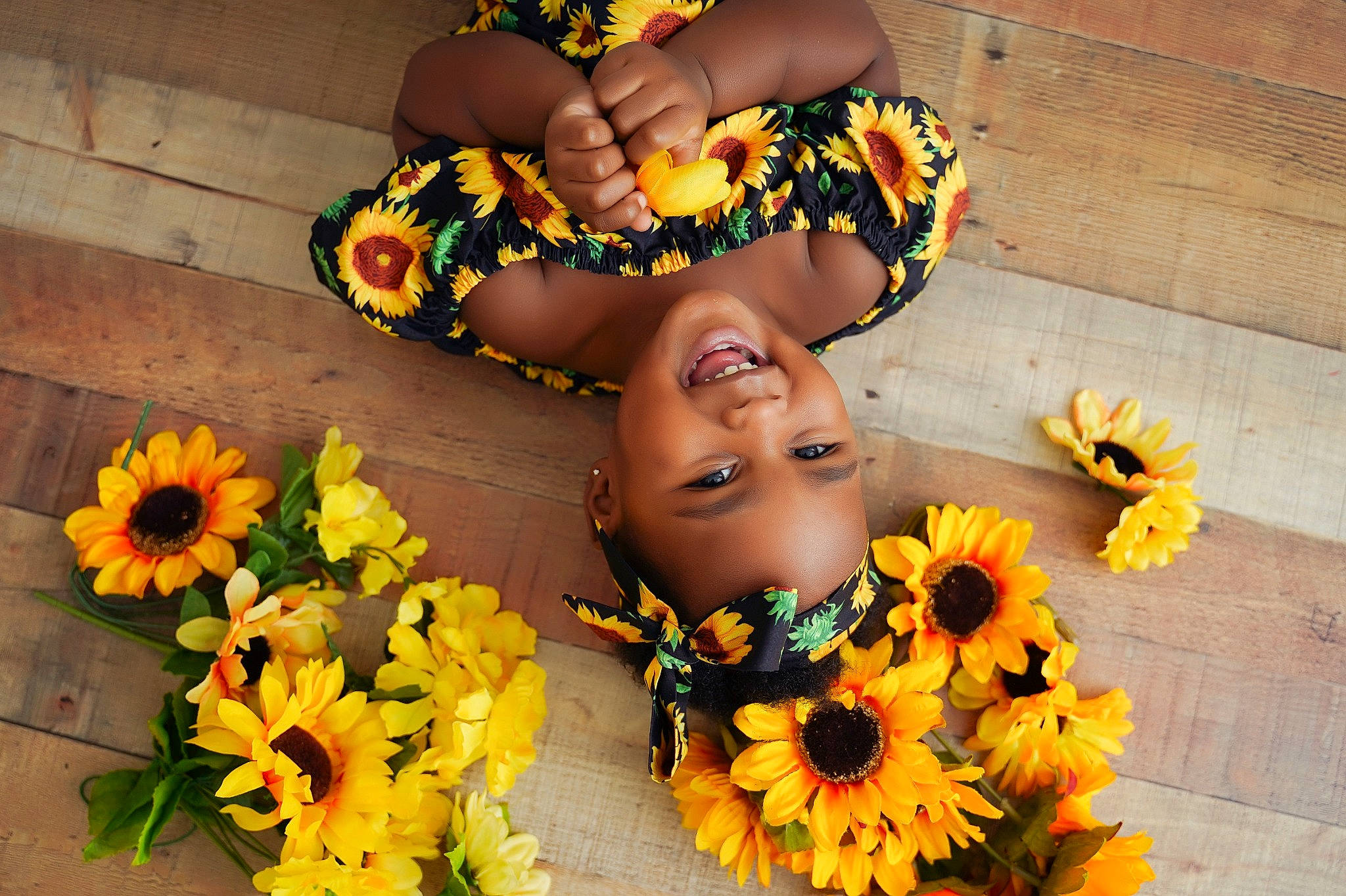 Makaylah is registered to the contest to win money with this photo: beauty, bouquet, event, eye, facial_expression, flower, flower_arranging, flowering_plant, happy, head, headgear, headwear, joy, leaf, orange, organ, person, petal, photograph, plant