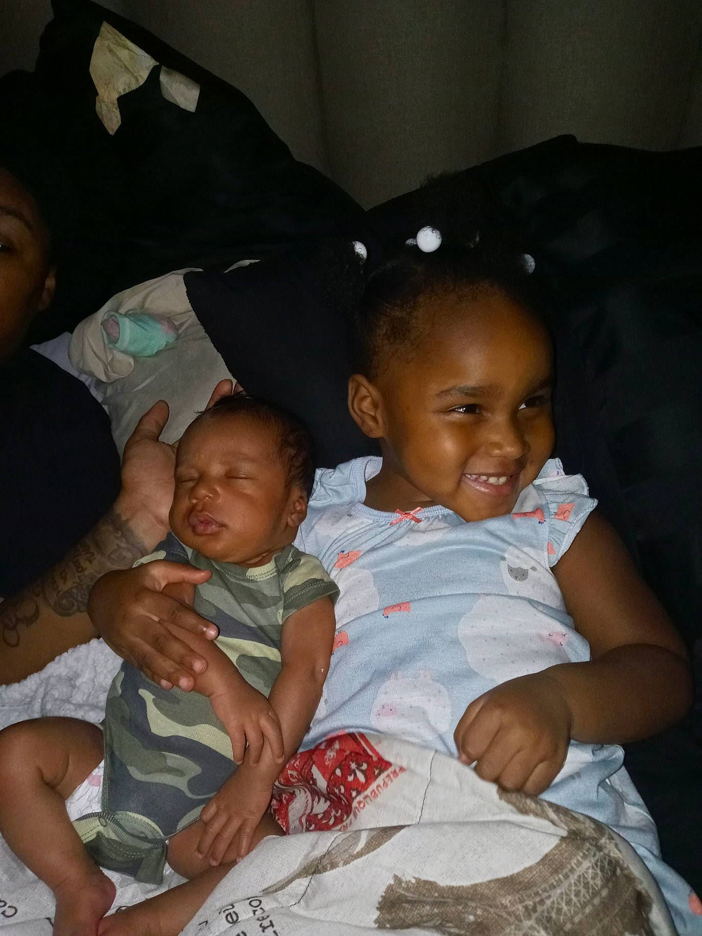 Makaylah is registered to the contest to win money with this photo: adaptation, black, cheek, child, comfort, event, eye, facial_expression, finger, fun, hairstyle, happy, head, human, joy, lap, person, sharing, skin, smile