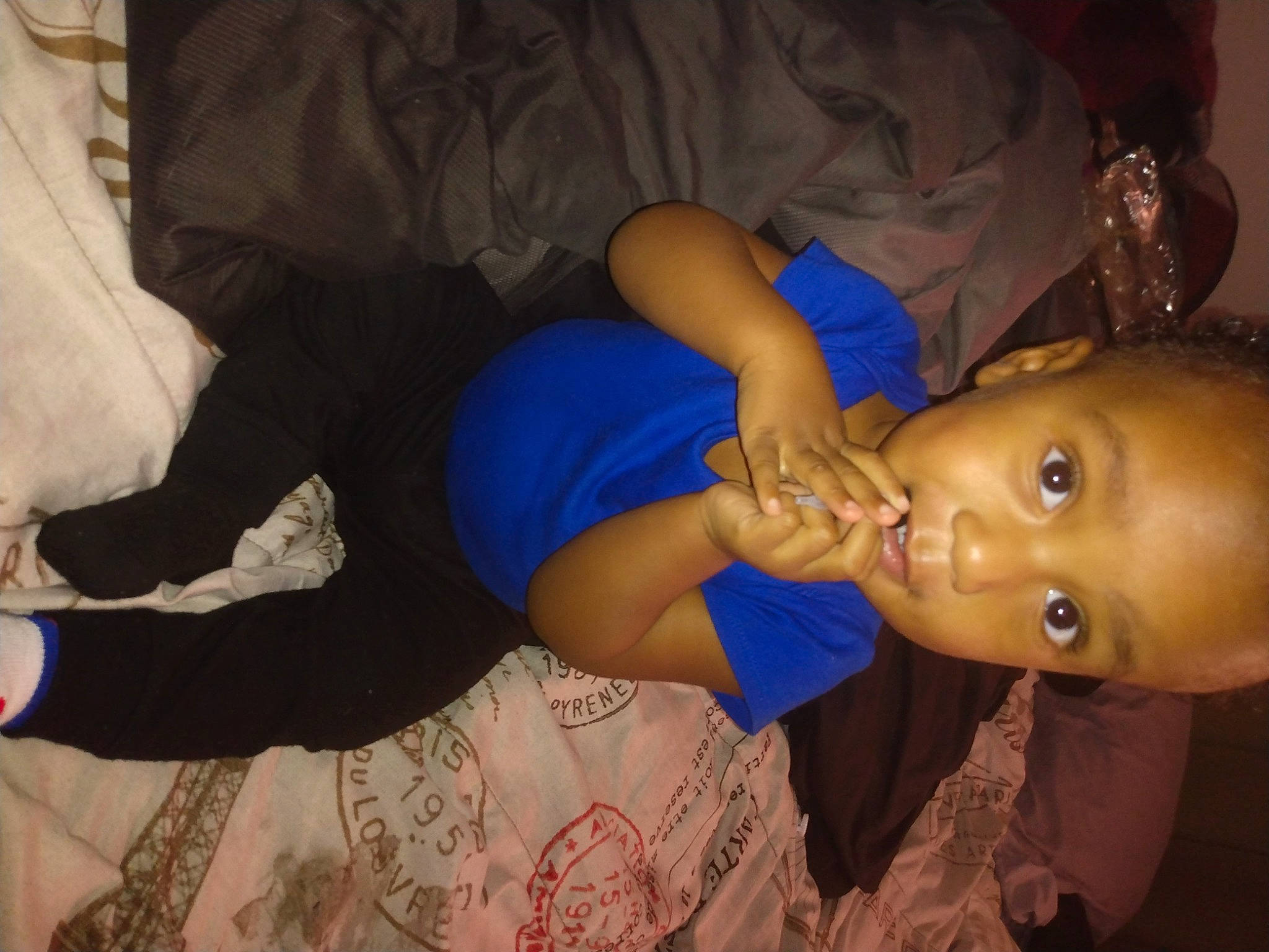 Andrew is registered to the contest to win money with this photo: chest, child, comfort, ear, elbow, electric_blue, event, fun, gesture, happy, human_body, linens, mouth, nail, nose, party, person, t_shirt, thumb, toddler