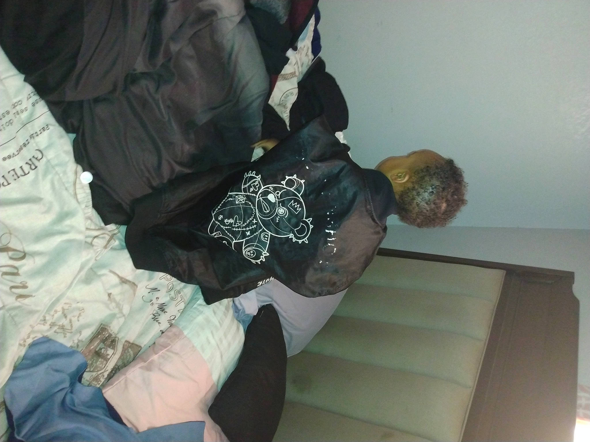 Andrew is registered to the contest to win money with this photo: comfort, elbow, human_leg, pattern, person, room, sitting, sleeve, stairs, thigh, tree, wrist