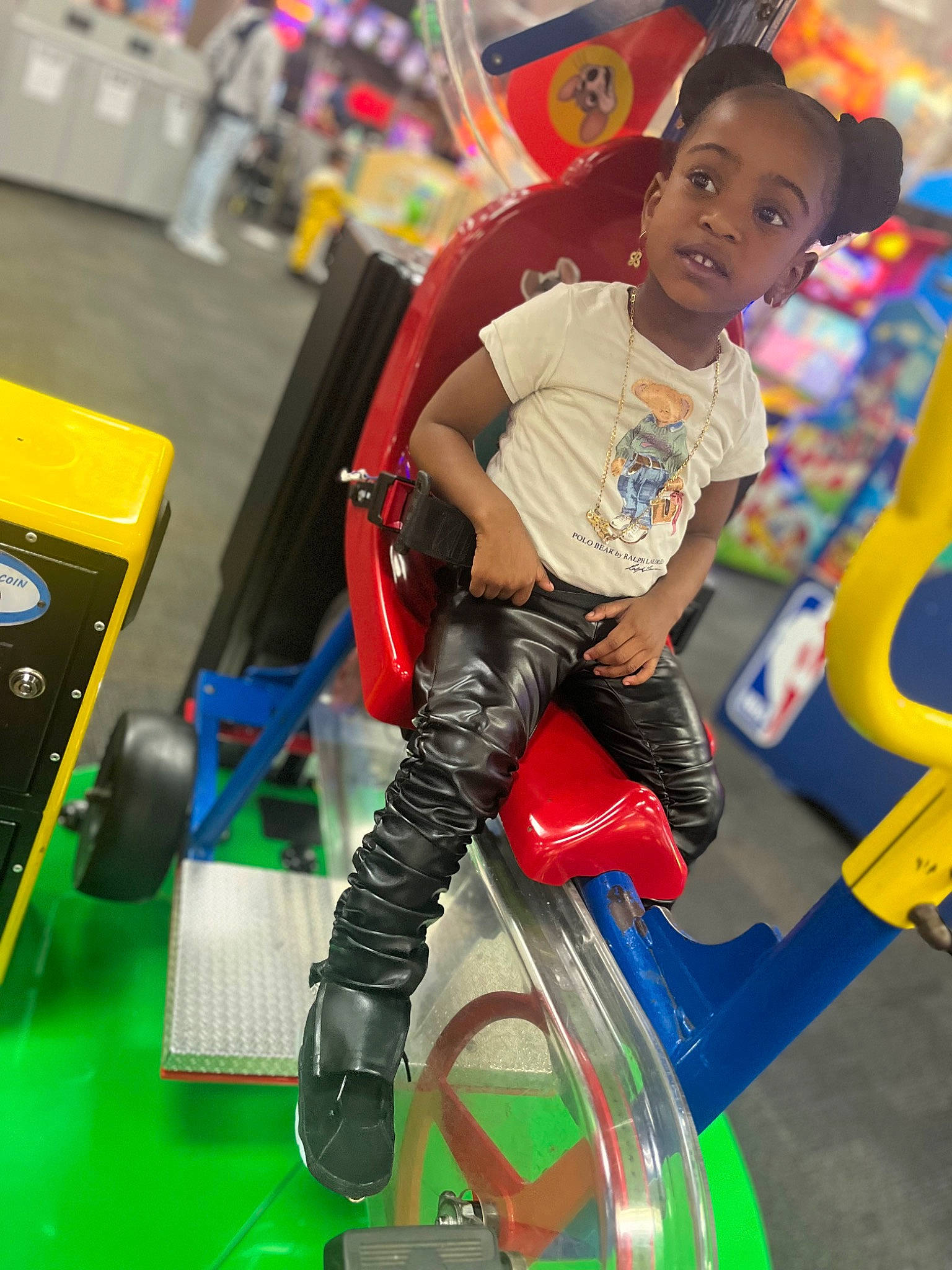 Lashawn is registered to the contest to win money with this photo: amusement_ride, child, chute, city, electric_blue, event, fun, happy, hat, leisure, machine, outdoor_play_equipment, person, play, playground, recreation, sportswear, t_shirt, thigh, toddler
