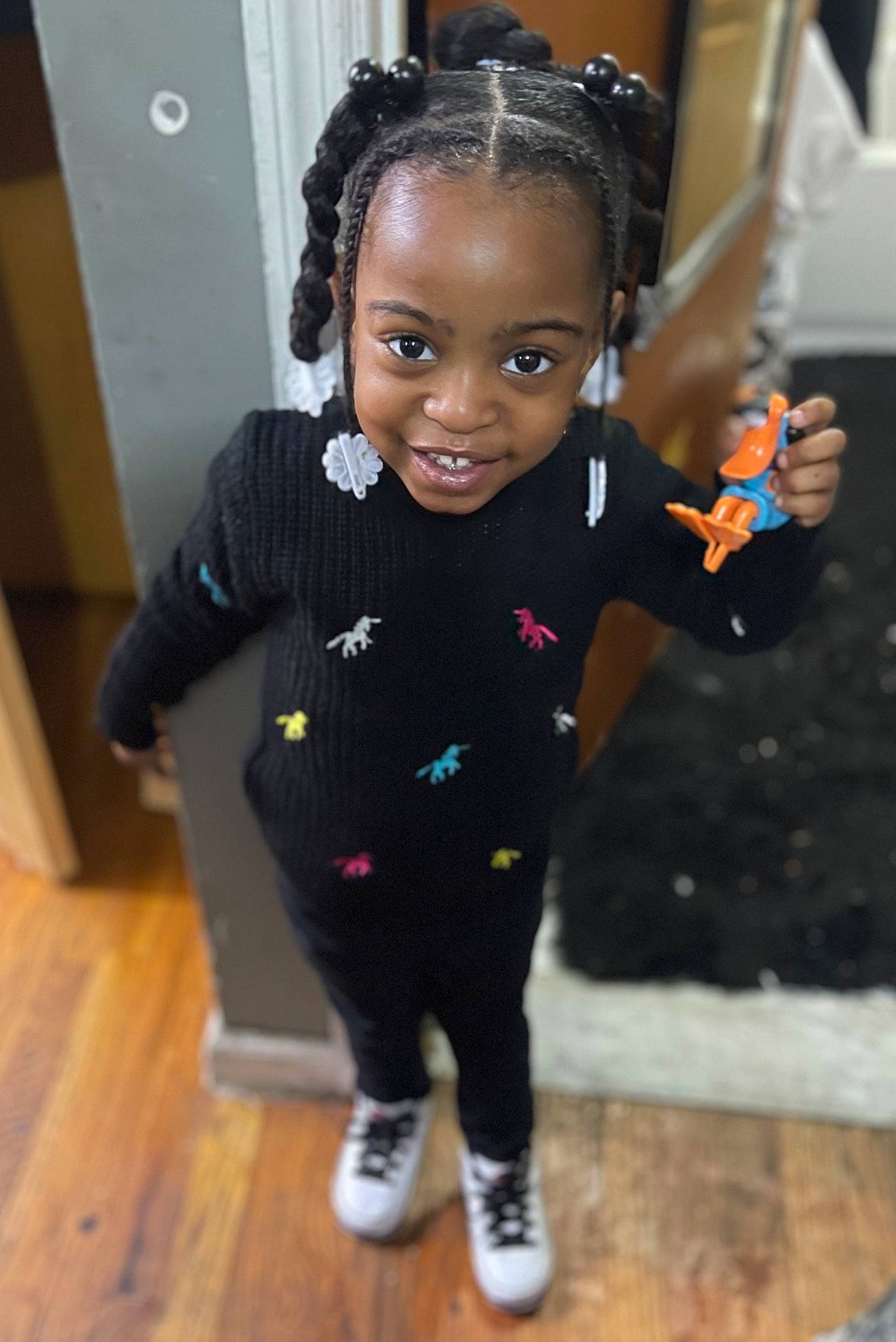 Lashawn is registered to the contest to win money with this photo: baby_toddler_clothing, black_hair, child, cornrows, costume, face, fashion_design, flooring, fun, hair, happy, hardwood, head, jewellery, joy, person, room, skin, sleeve, smile