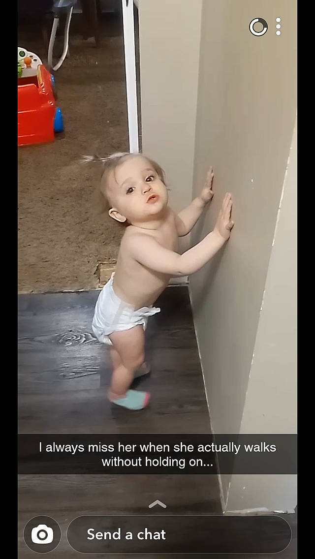 Emmie is registered to the contest to win money with this photo: abdomen, baby, barefoot, chest, child, diaper, elbow, flash_photography, floor, flooring, foot, fun, human_leg, knee, person, room, stomach, thigh, tire, toddler