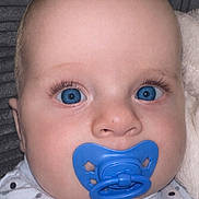 Cody joined the competition — help win amazing prizes! baby, blue_eyes, pacifier, close_up, infant, polka_dot_clothing, long_eyelashes, cute, face, child, newborn, soft_skin, sleepwear, lying_down, indoors, portrait, head, expressionless, baby_girl, baby_boy