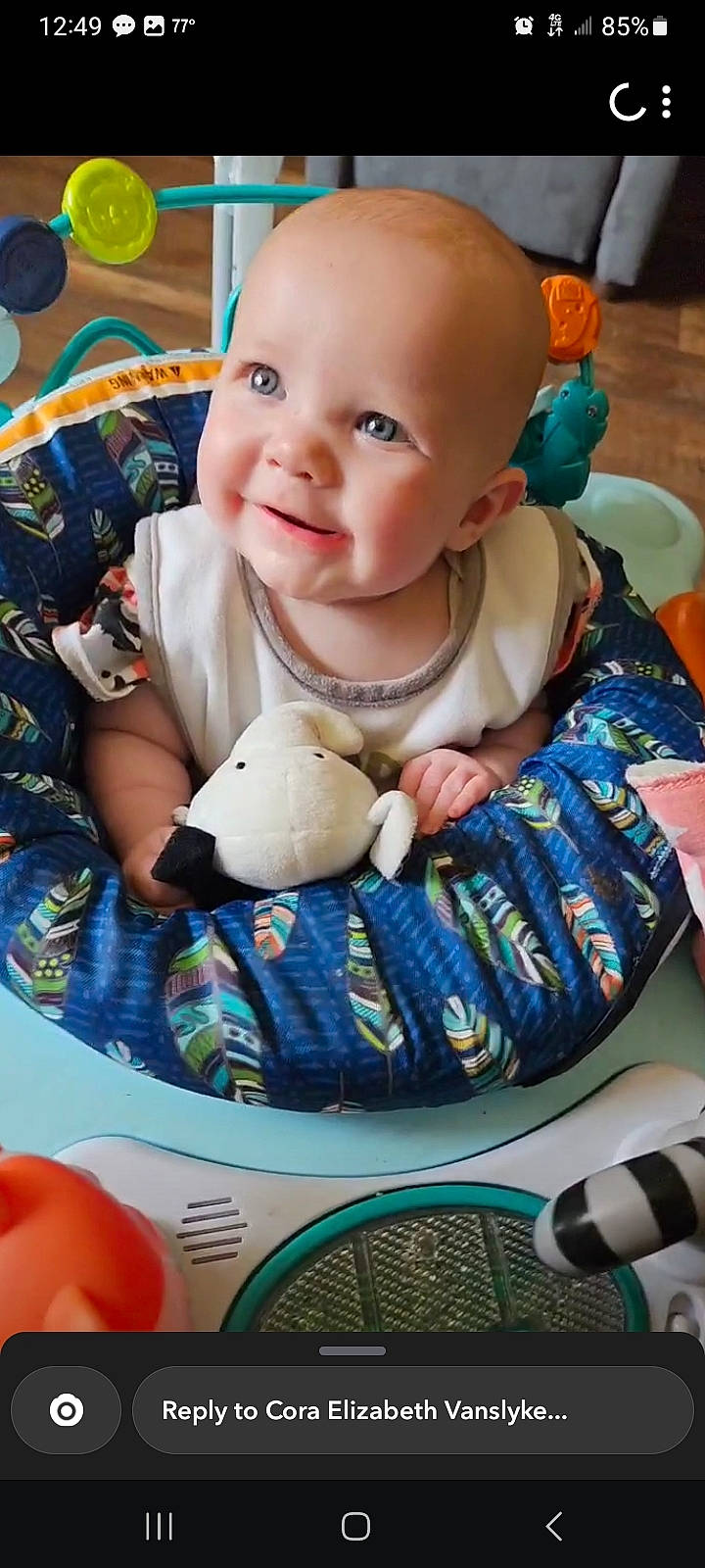 Taylor is registered to the contest to win money with this photo: baby, baby_products, baby_safety, baby_toddler_clothing, baby_toys, bib, blue, cheek, child, comfort, drinkware, happy, linens, pattern, person, product, sitting, skin, smile, t_shirt