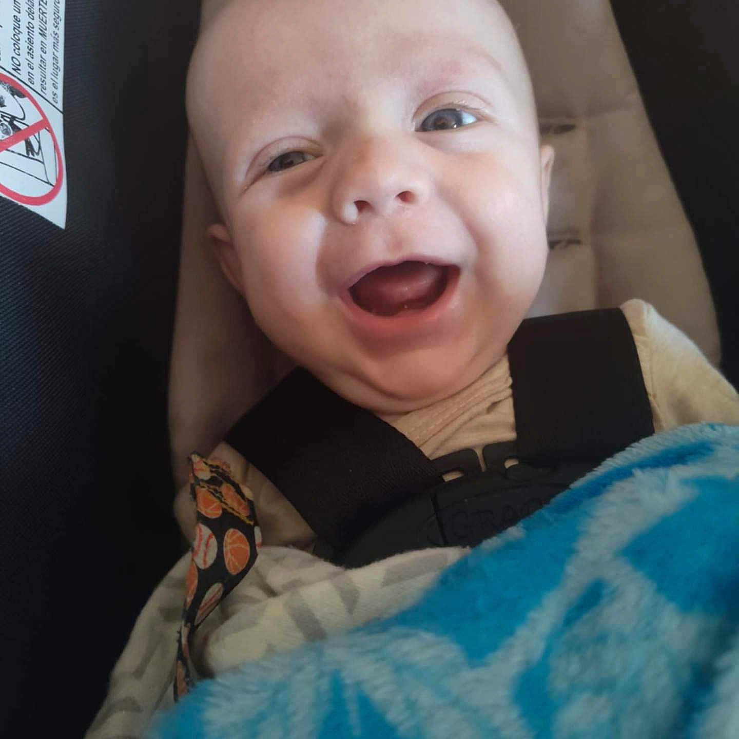 Jonathan joined the competition — help win amazing prizes! baby, babylaughing, cushion, face, happy, head, homedecor, laughing, newborn, person, photography, portrait, smile