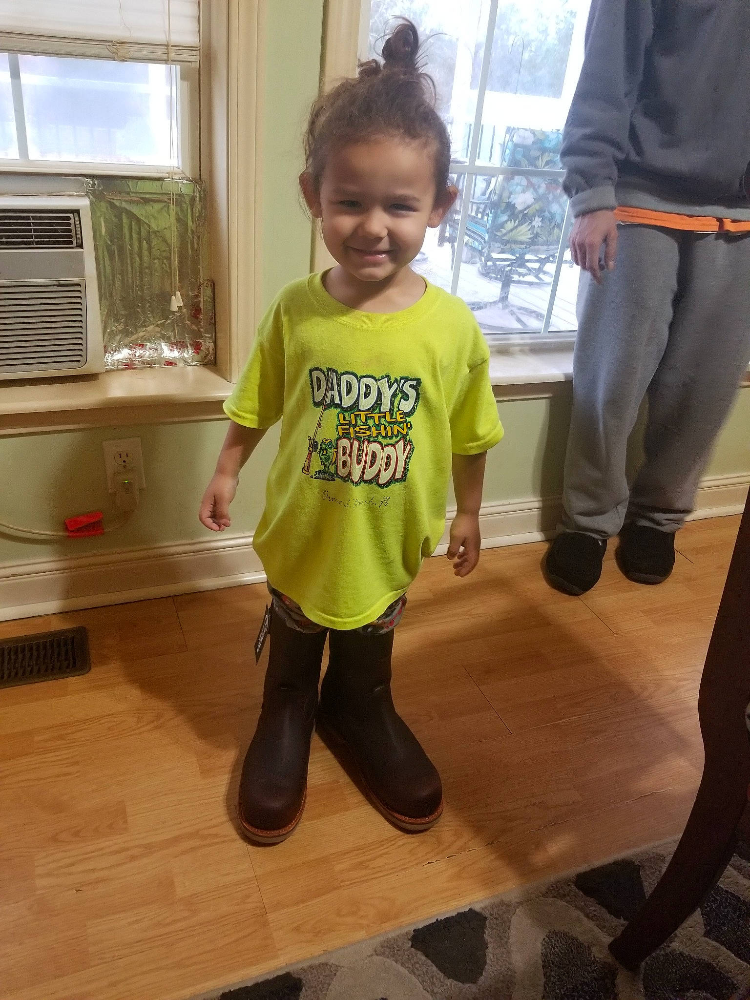 Quinton is registered to the contest to win money with this photo: child, floor, flooring, hardwood, joy, person, standing, t_shirt, toddler