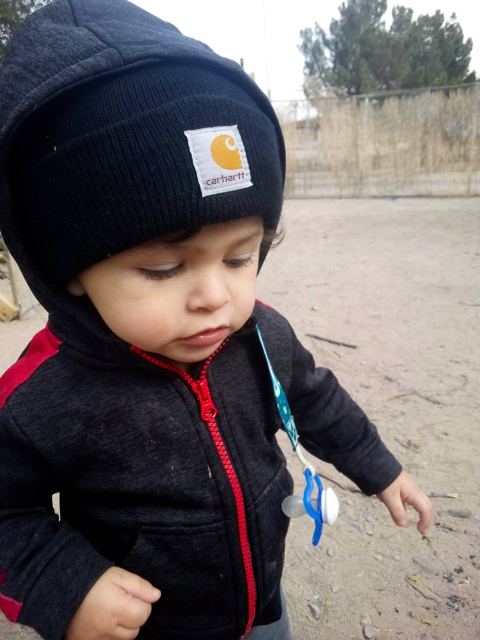 Dominick joined the competition — help win amazing prizes! baby, baby_toddler_clothing, beanie, cap, child, cool, electric_blue, fashion_accessory, happy, headwear, knit_cap, person, sky, sleeve, toddler, tourism, travel, tree, vacation, winter