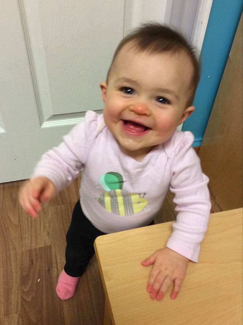 Ada joined the competition — help win amazing prizes! baby, baby_toddler_clothing, cheek, child, ear, eye, facial_expression, finger, hand, joint, joy, laugh, mouth, nose, organ, person, skin, sleeve, standing, thumb