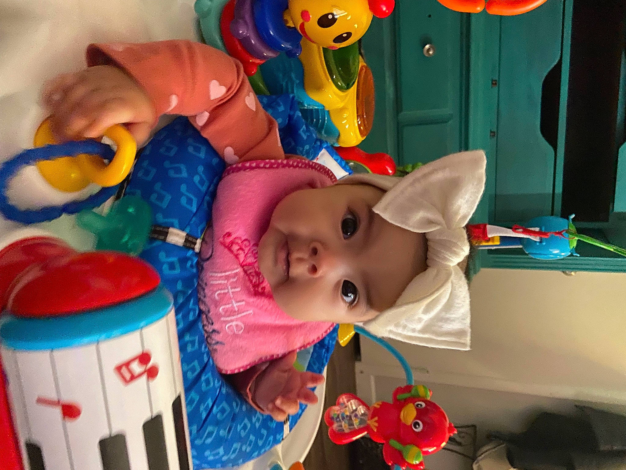 Ellianna is registered to the contest to win money with this photo: baby, baby_products, baby_toys, child, fun, hat, headwear, kindergarten, leisure, party, party_supply, person, plastic, play, room, smile, stuffed_toy, toddler, toy
