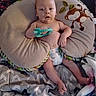 Jimmy joined the competition — help win amazing prizes! baby, infant, child, portrait, lying_down, cushion, baby_nest, toy, teether, diaper, blanket, monkey, plush_toy, bed, indoors, cozy, looking_at_camera, barefoot, sitting, photography