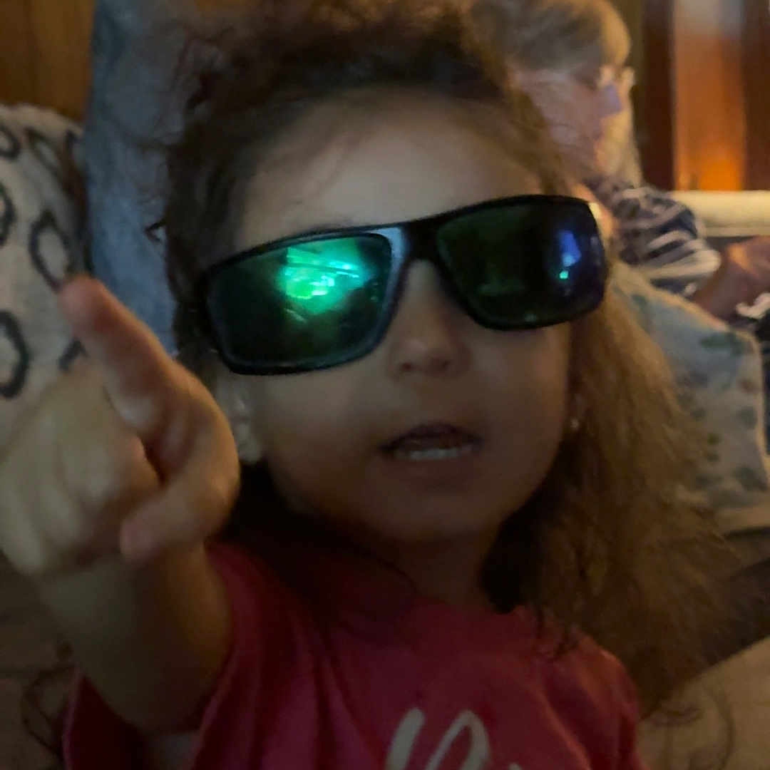 Skyler joined the competition — help win amazing prizes! accessories, baby, bodypart, clothing, couch, cushion, face, finger, furniture, glasses, goggles, hand, head, homedecor, person, photography, portrait, selfie, sunglasses, t_shirt