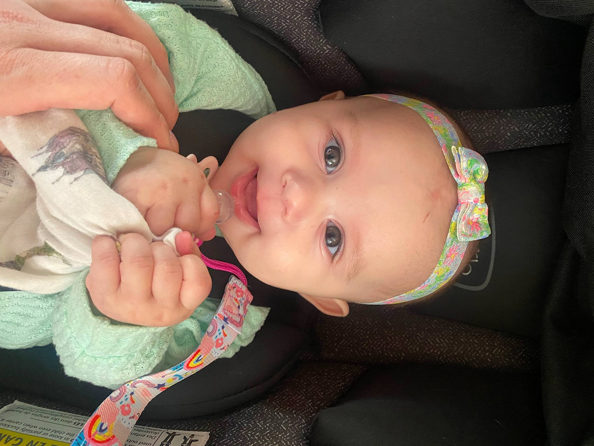 Leila is registered to the contest to win money with this photo: baby, baby_toddler_clothing, beauty, cheek, child, comfort, eyelash, finger, gesture, hand, human_body, iris, mouth, nail, nose, person, product, skin, smile, thumb