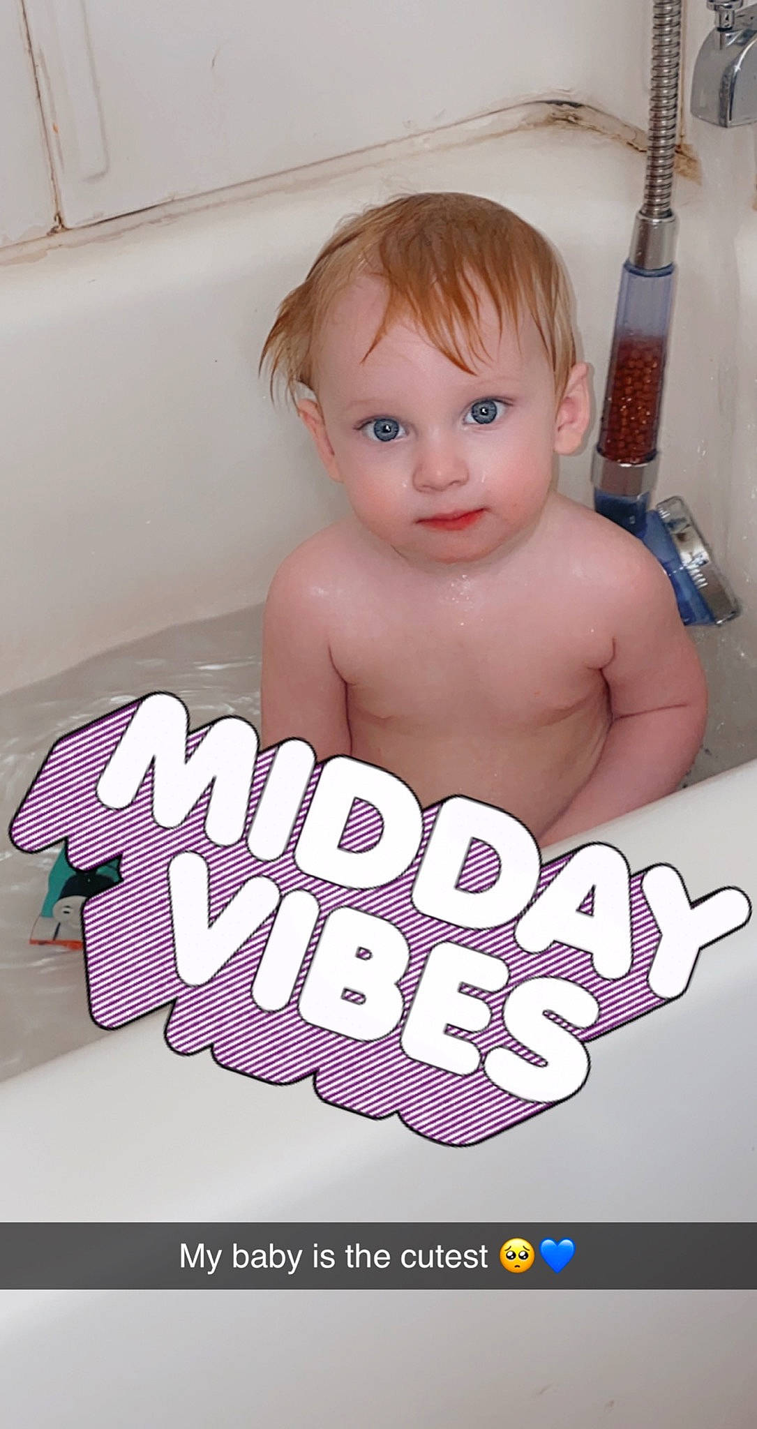 Douglas is registered to the contest to win money with this photo: abdomen, arm, baby, bathing, blond, cheek, chest, child, eyebrow, eyelash, finger, font, happy, mouth, person, photo_caption, pink, skin, thumb, toddler