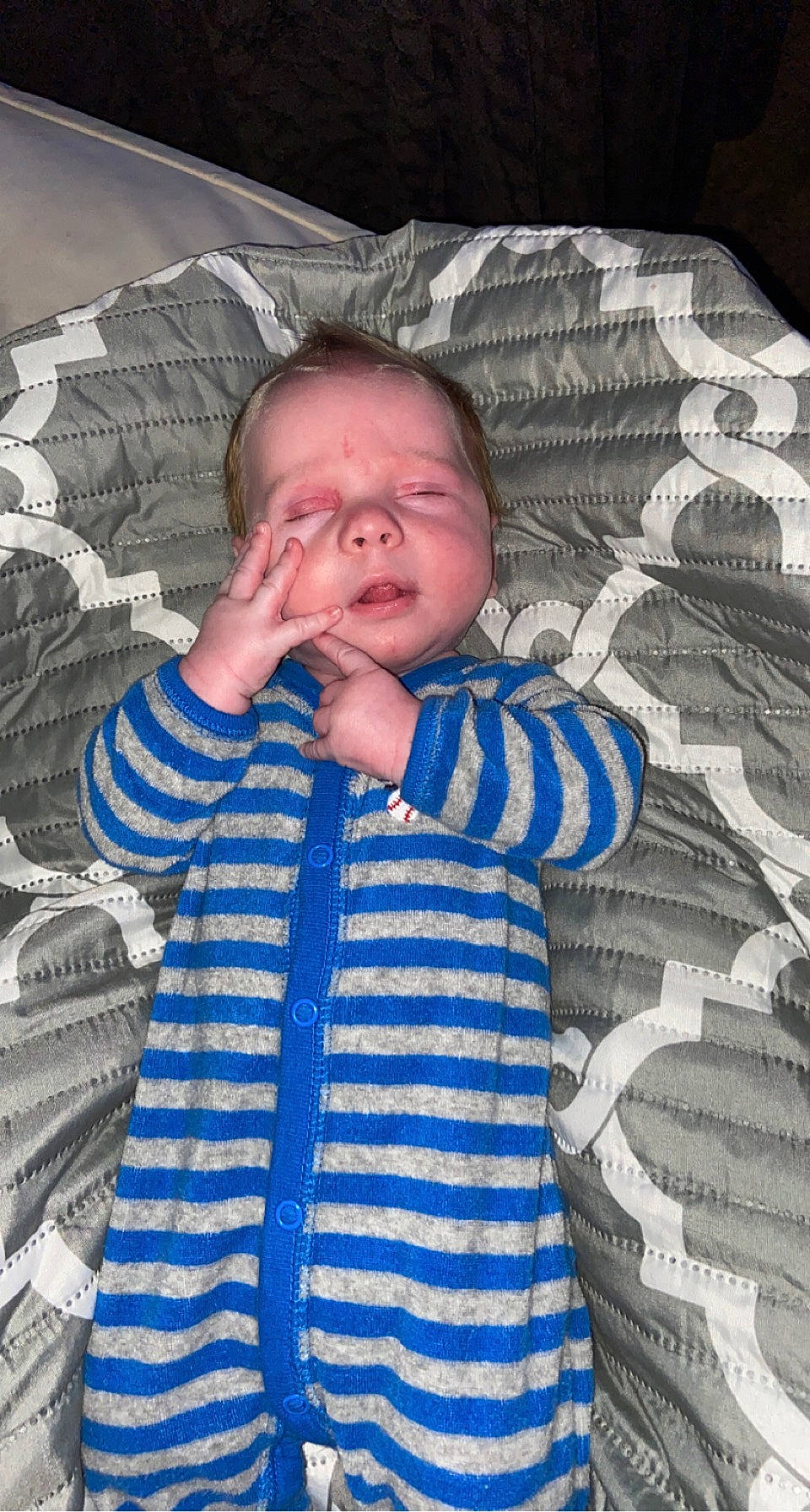 Douglas is registered to the contest to win money with this photo: baby, baby_toddler_clothing, cheek, comfort, cool, eye, facial_expression, finger, hairstyle, human, human_body, iris, mouth, nose, organ, person, product, skin, sleeve, textile