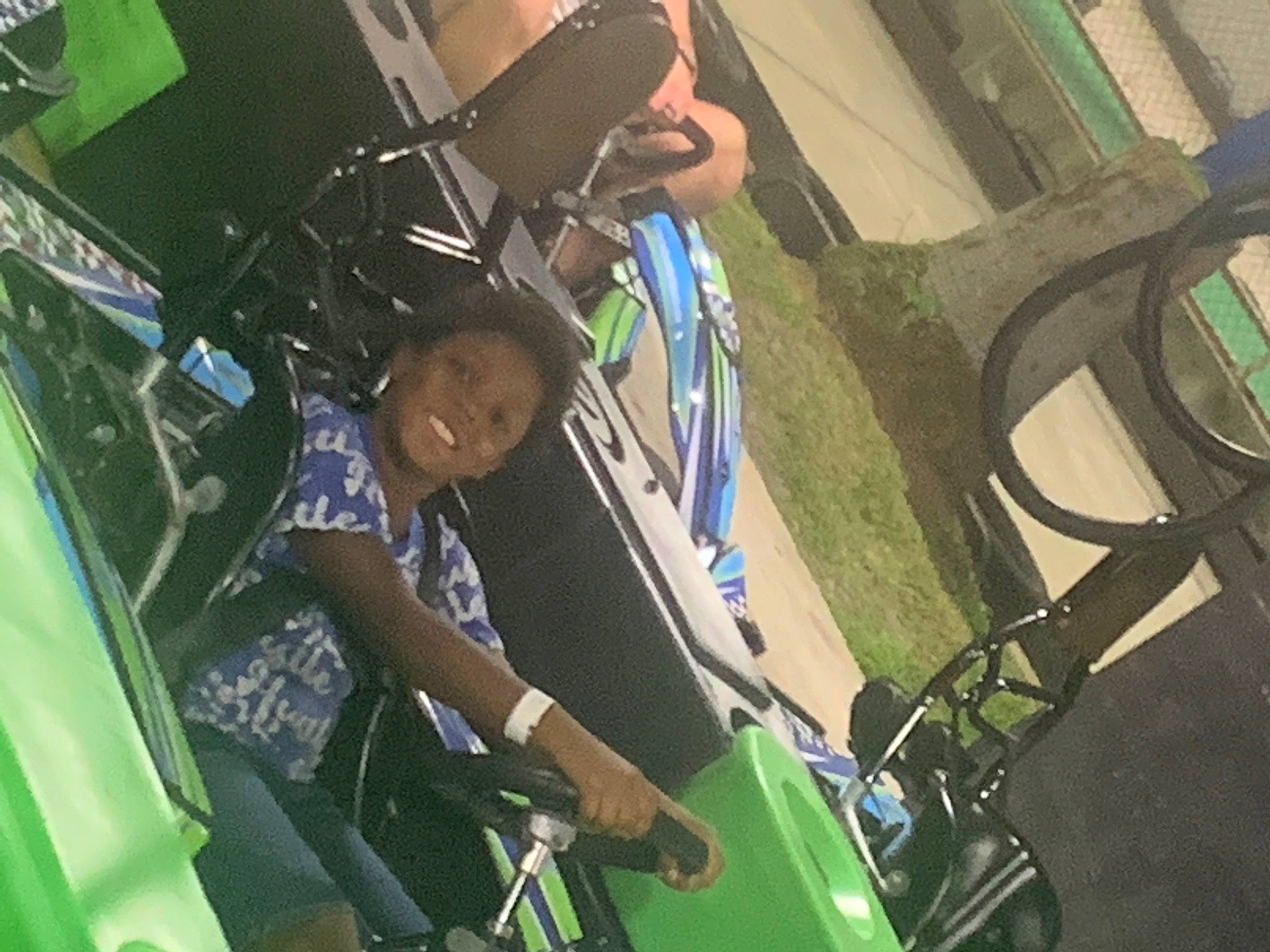 Majustici is registered to the contest to win money with this photo: auto_part, automotive_design, automotive_exterior, automotive_lighting, automotive_tire, automotive_wheel_system, automotive_window_part, engineering, fender, glass, grass, green, hat, hood, human_leg, leisure, motor_vehicle, person, personal_protective_equipment, vehicle_door